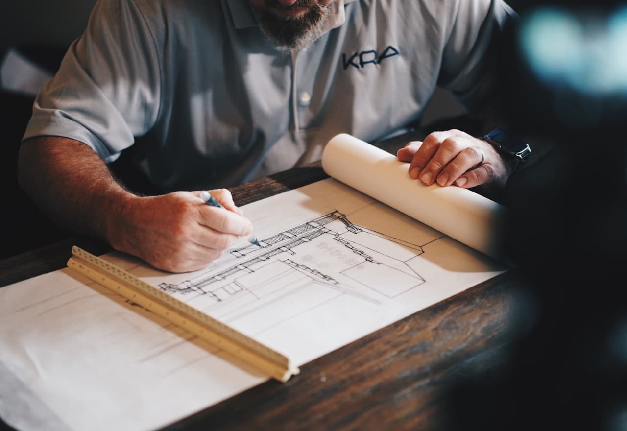 An engineer reviewing technical detail on a workstation screen